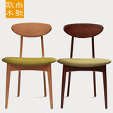 北欧现代简约实木餐椅蝴蝶椅创意咖啡休闲椅宜家餐椅绿布艺靠背椅