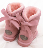 冬季韩版糖果色蝴蝶结雪地靴真皮保暖羊毛女短靴防滑圆头短筒女靴