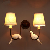 欧式复古创意壁灯美式现代床头灯个性布艺温馨卧室儿童小鸟壁灯