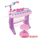 正品第四代多功能儿童电子琴三角小钢琴音乐玩具带麦克风接mp3包