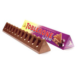 特价 瑞士toblerone三角牛奶巧克力含葡萄干蜂蜜奶油杏仁糖100g