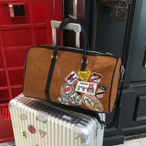 短途大容量旅行包女手提韩版潮牛皮行李包旅行袋女出差旅游行李包