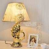 欧式客厅台灯卧室床头灯具金色孔雀陶瓷大气温馨创意婚房led灯饰
