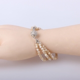 天然贝壳材质米黄珍珠贝4毫米钢丝三圈磁扣手链手串特价包邮女
