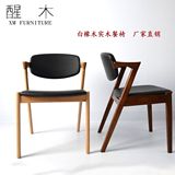 北欧宜家纯实木餐椅现代简约咖啡厅白橡木扶手椅子靠背皮艺Z型椅