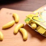 日本进口Meiji/明治脆皮香蕉型牛奶巧克力豆 甜味儿童零食37g