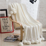纯白色针织毯子休闲毯午睡毛线毯沙发盖毯摄影道具床尾巾毛球流苏