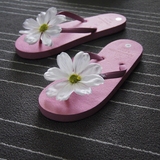 新款时尚手工花朵凉拖海边度假韩版沙滩拖鞋女夏平跟人字拖女夹脚