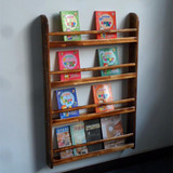实木做旧原木壁挂墙上儿童碳化展示架幼儿园专用绘本图书架杂志架