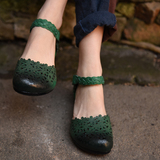 阿木吐火罗原创16新款真皮包头凉鞋女 镂空花朵搭扣舒适低跟女鞋