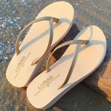 路拉迪简约女士人字拖夏季韩版厚底中跟坡跟潮防滑沙滩平底凉拖鞋