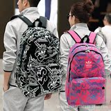 大容量旅行包背包初中学生书包男双肩包女韩版时尚潮流帆布电脑包