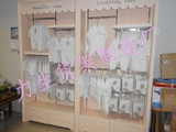 品牌婴幼儿服装专卖店木质展示柜母婴用品中岛柜童装挂衣柜定做