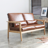 日式复古坐具北欧设计师皮艺沙发椅单人双人小户型咖啡厅实木家具