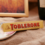 瑞士进口 Toblerone瑞士三角牛奶巧克力含蜂蜜奶油巴旦木50g