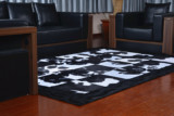黑白奶牛皮拼接地毯高档别墅书房会议室客厅茶几卧室可定制地垫