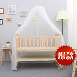 婴儿床实木宝宝床多功能白色带滚轮童床带护栏可变书桌送蚊帐
