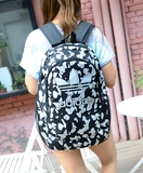 新款时尚双肩包韩版男女高中学生书包情侣背包帆布休闲运动旅行包