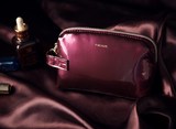 2016年夏季新款深紫色亮漆皮手挽化妆包手拿包洗漱收纳包女包包