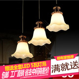 热卖灯饰正品欧式简约创意个性圆形灯罩餐厅饭厅树脂三头吊灯特价