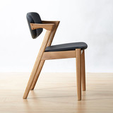 北欧实木餐椅现代简约PU皮软包靠背餐厅椅设计师休闲椅子扶手z字