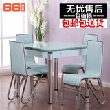 伸缩餐台钢化玻璃餐桌椅组合小户型长方形饭桌简约现代一桌四椅