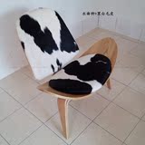 现代艺术微笑贝壳椅 天然奶牛毛皮椅 休闲三角音单人沙发椅