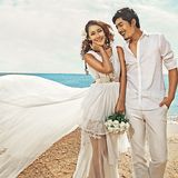 2015影楼主题服装海边外景拍照礼服情侣写真婚纱摄影沙滩白色长裙
