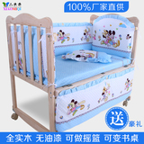 婴儿床实木无漆摇篮床 BB游戏床可变书桌儿童床 带滚轮摇床宝宝床